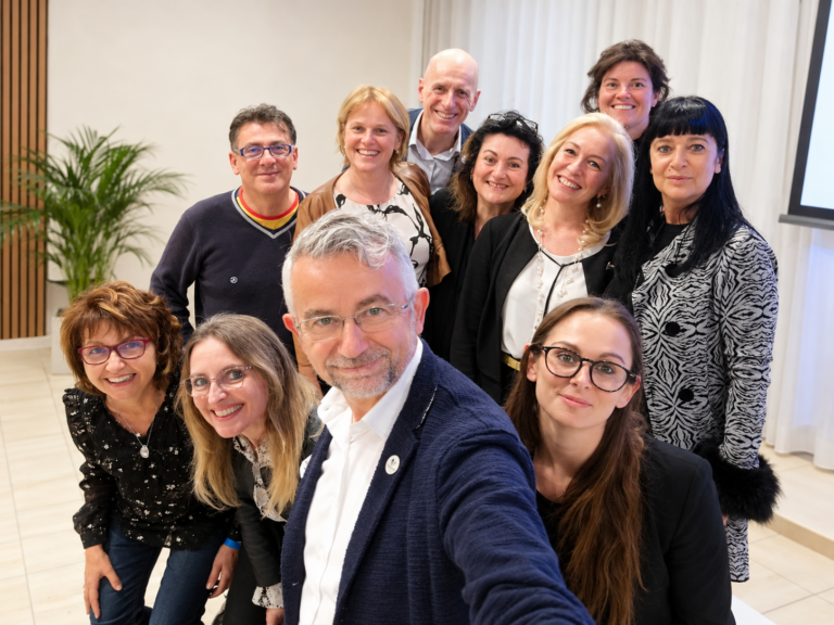 Fabio Gelmetti con un gruppo di collaboratori, 2019.